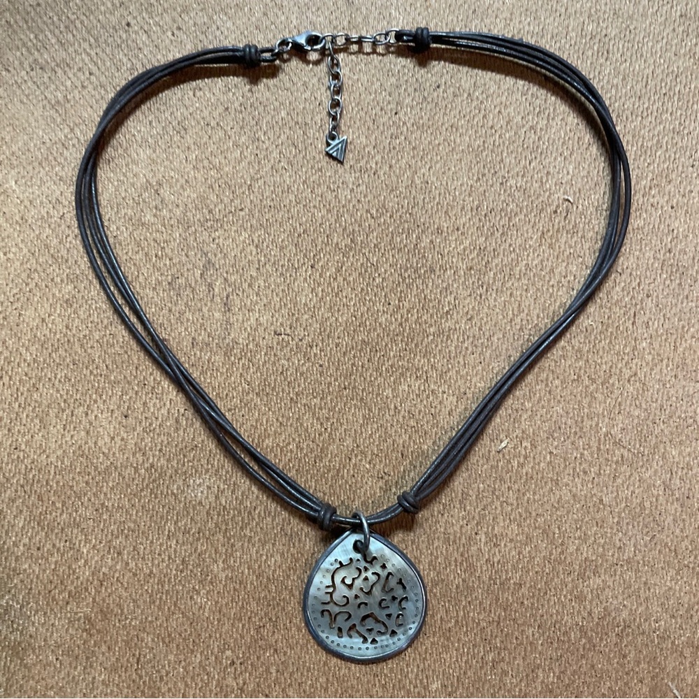 Silpada, sterling, silver, iridescent lip, shell,
leather necklace